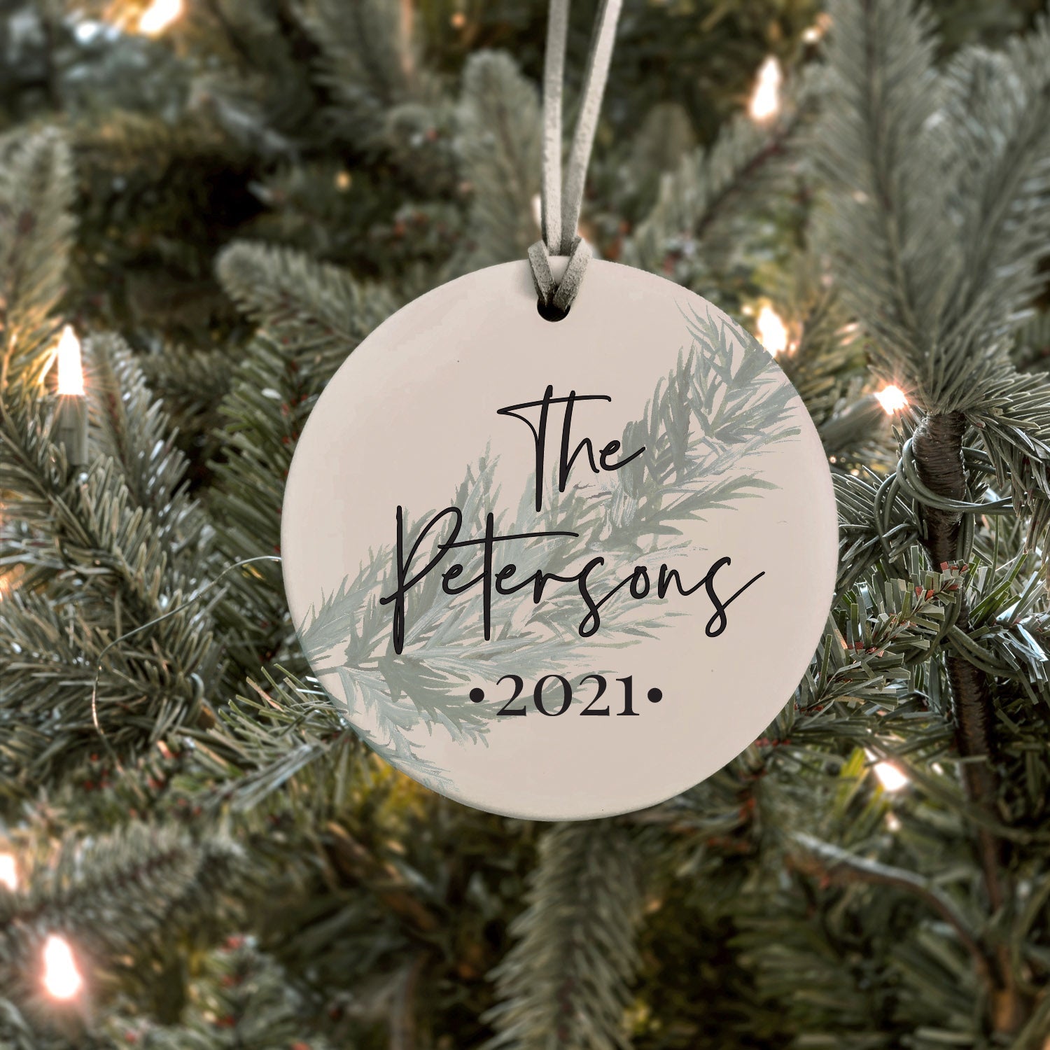 Custom Family Name Christmas Ornament | 3" Ceramic Keepsake to add a personalized and special touch to your holiday décor.